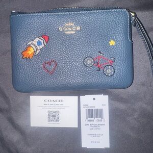 Coach novelty navy blue wristlet NWT